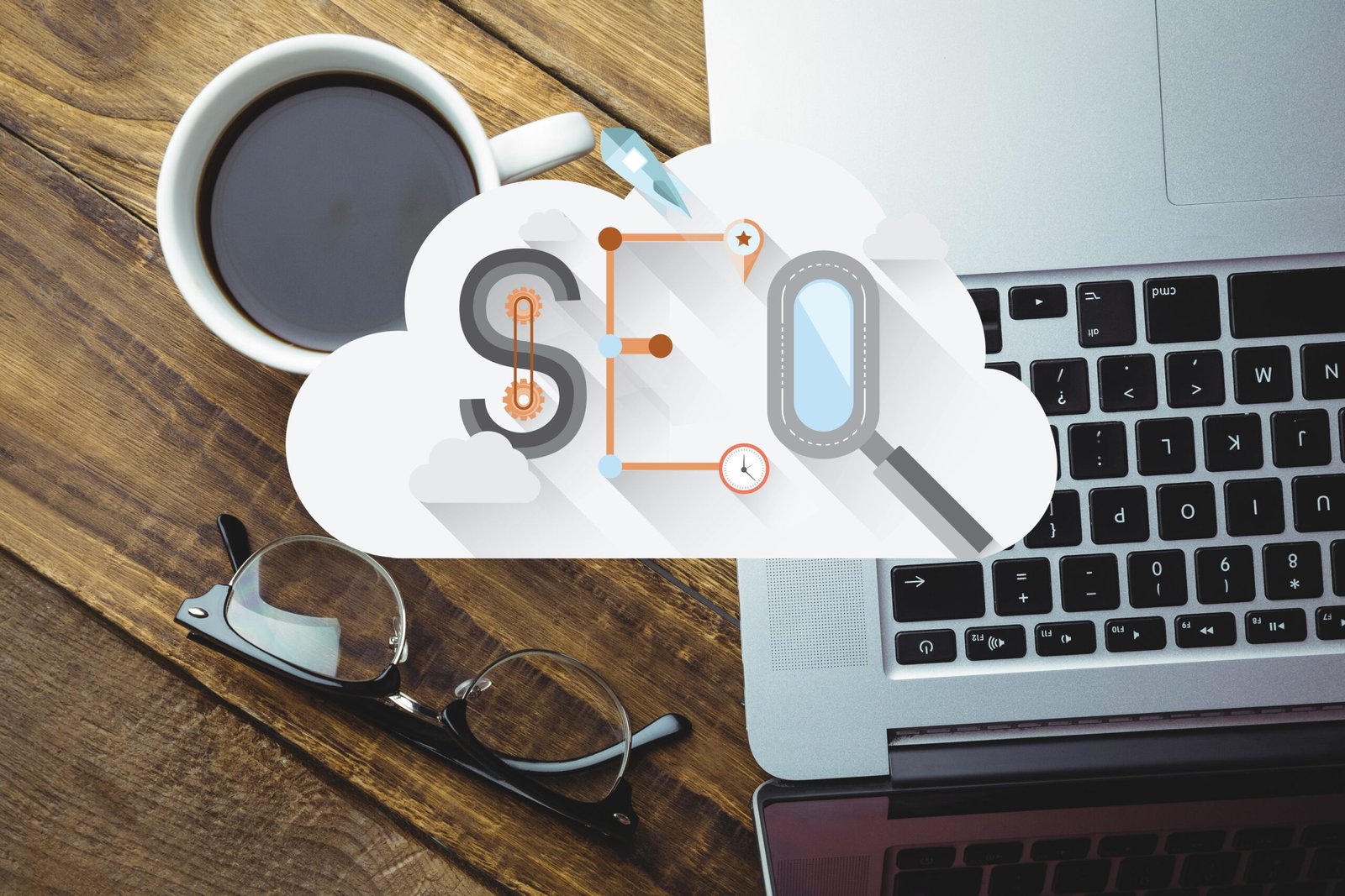 digital-composite-of-coffee-with-laptop-and-seo-graphics